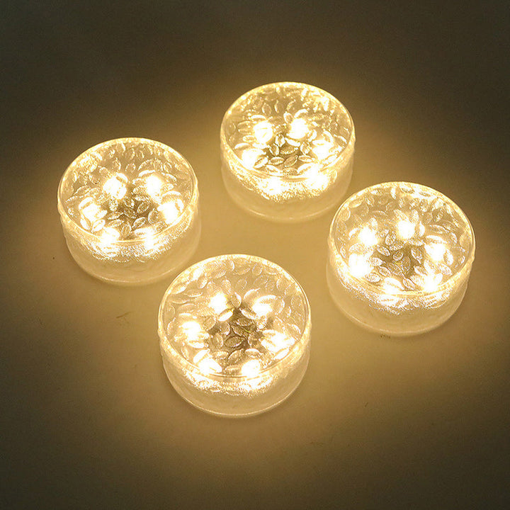 Rund LED-solcellelampe formet som en isblokk, laget av akryl for utendørs bruk