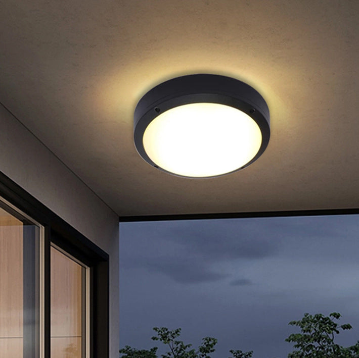 Vanntett rund LED-taklampe laget av aluminium og akryl for utendørs bruk, for innfelt montering i hagen.
