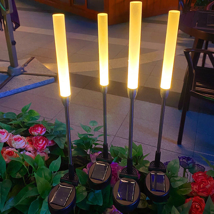 Vanntett solcelledrevet sylinderlampe laget av akryl, aluminium, rustfritt stål og ABS med LED-belysning for utendørs bruk og hagedesign.
