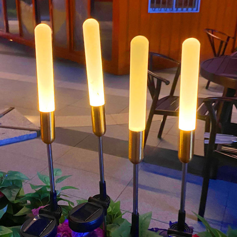 Vanntett solcelledrevet sylinderlampe laget av akryl, aluminium, rustfritt stål og ABS med LED-belysning for utendørs bruk og hagedesign.