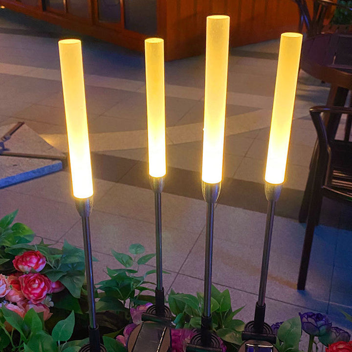 Vanntett solcelledrevet sylinderlampe laget av akryl, aluminium, rustfritt stål og ABS med LED-belysning for utendørs bruk og hagedesign.