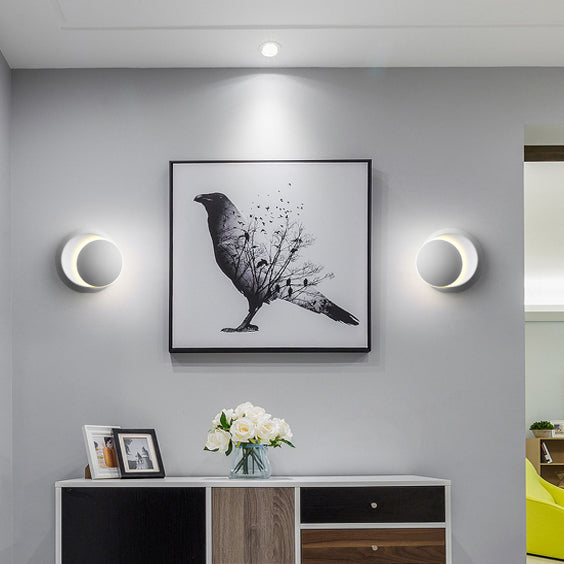 Skanto | Moderne nordisk jern rund eklips roterbar LED vegglampe for nattbord