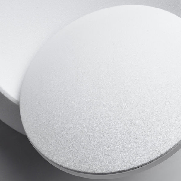 Skanto | Moderne nordisk jern rund eklips roterbar LED vegglampe for nattbord