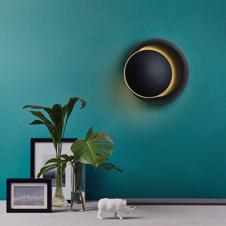 Skanto | Moderne nordisk jern rund eklips roterbar LED vegglampe for nattbord