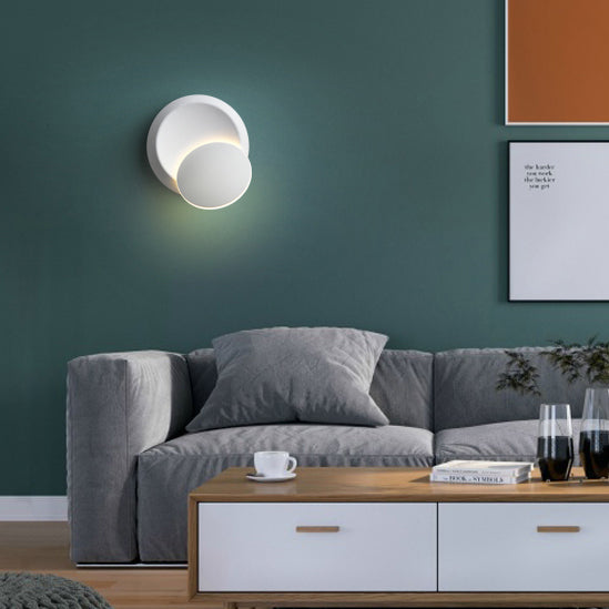 Skanto | Moderne nordisk jern rund eklips roterbar LED vegglampe for nattbord