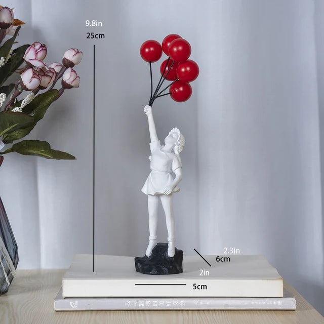 Skulptur eines Mädchen mit Ballon im Banksy-Stil für Tischdekoration und kreative Wohnzimmerdekoration