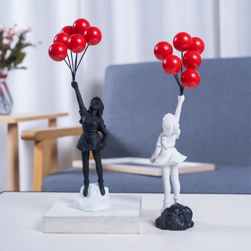 Skulptur eines Mädchen mit Ballon im Banksy-Stil für Tischdekoration und kreative Wohnzimmerdekoration