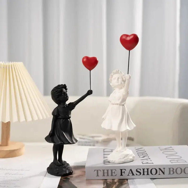 Skanto | Banksy flygende ballongjente statue