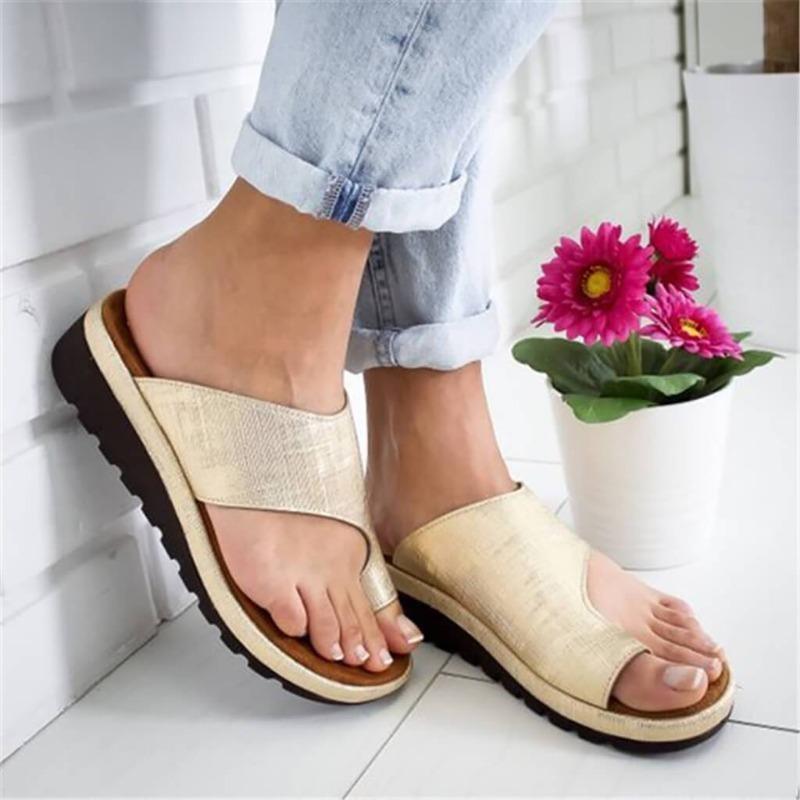 Ortopediske damesandaler, korrigering av hallux valgus