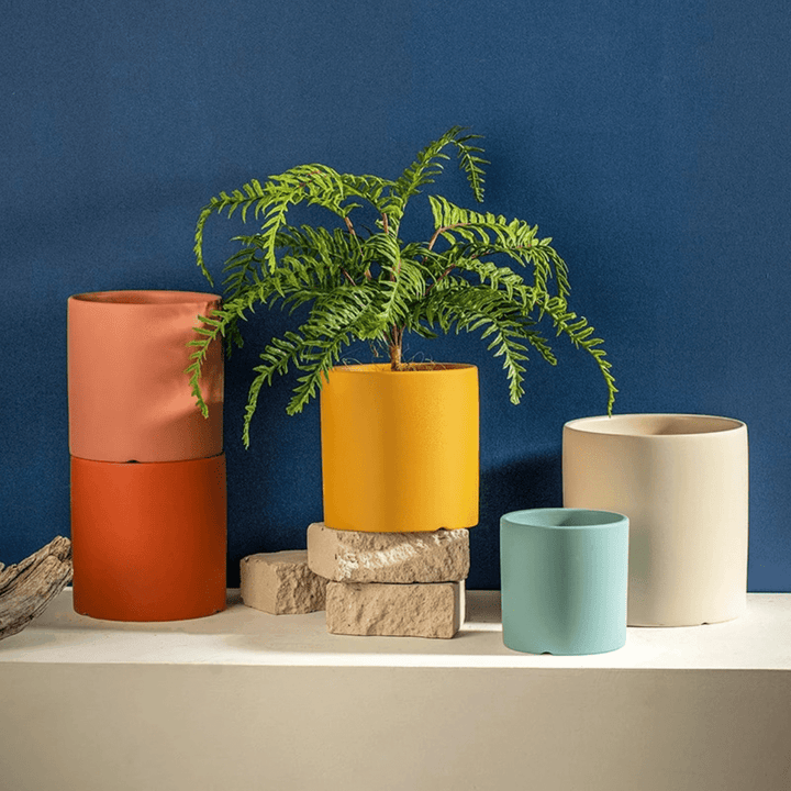 Skanto | Elegant blomsterpotte laget av keramikk med underskål