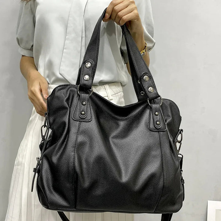 Skanto | Damens totebag med myk faux skinn følelse og praktiske flere rom