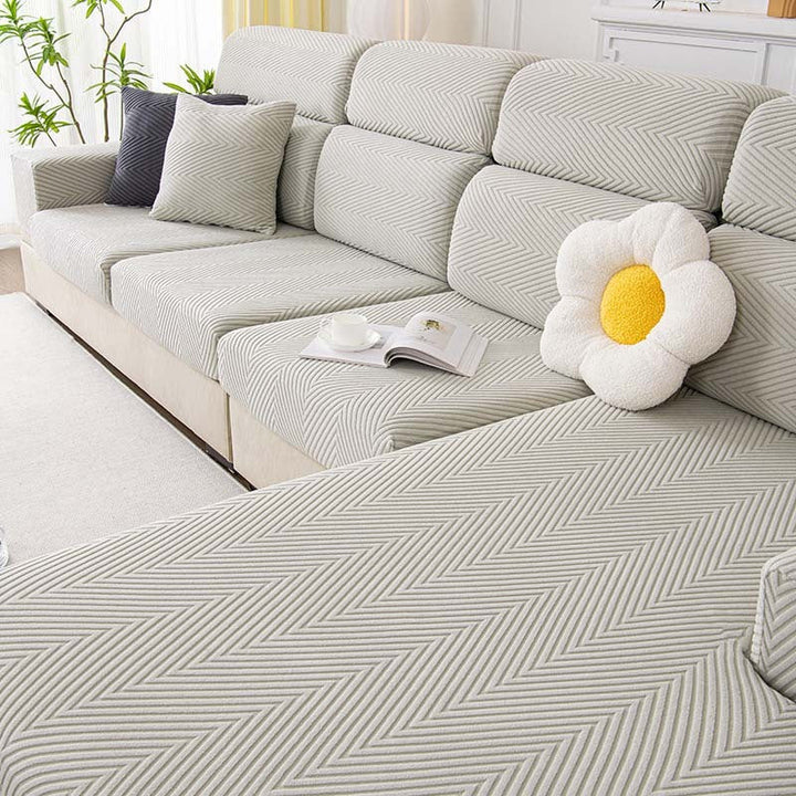 Fullstendig innpakket fiskebensmønster sofaovertrekk i slitesterk chenille | Skanto