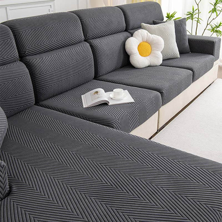 Fullstendig innpakket fiskebensmønster sofaovertrekk i slitesterk chenille | Skanto