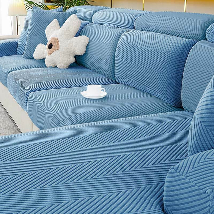 Fullstendig innpakket fiskebensmønster sofaovertrekk i slitesterk chenille | Skanto