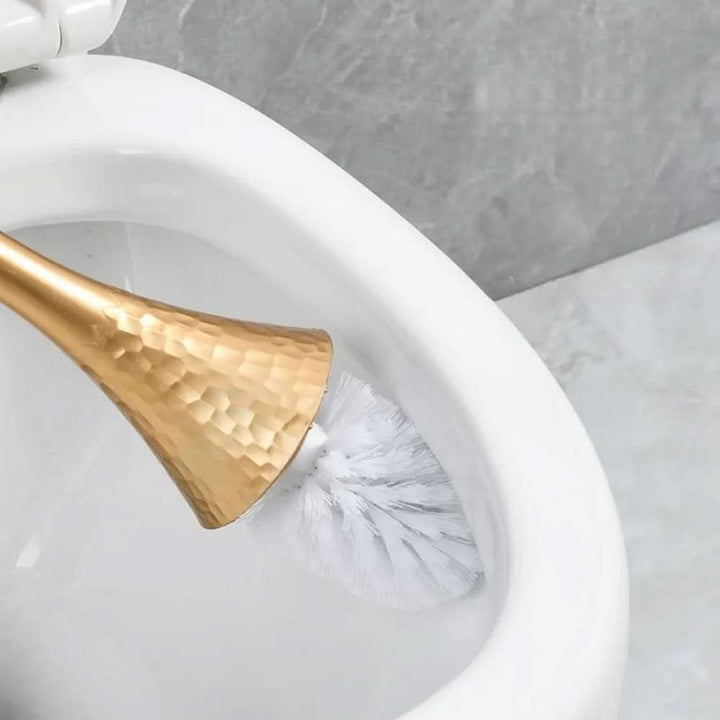 Elegante toalettbürste i moderne Golddesign for stil og hygiene