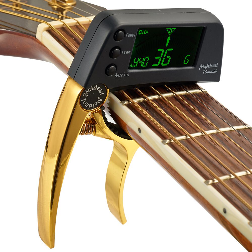 Capo & Tuner "TuneGrip" – 2-i-1 gitar tilbehør med LCD-skjerm | Skanto
