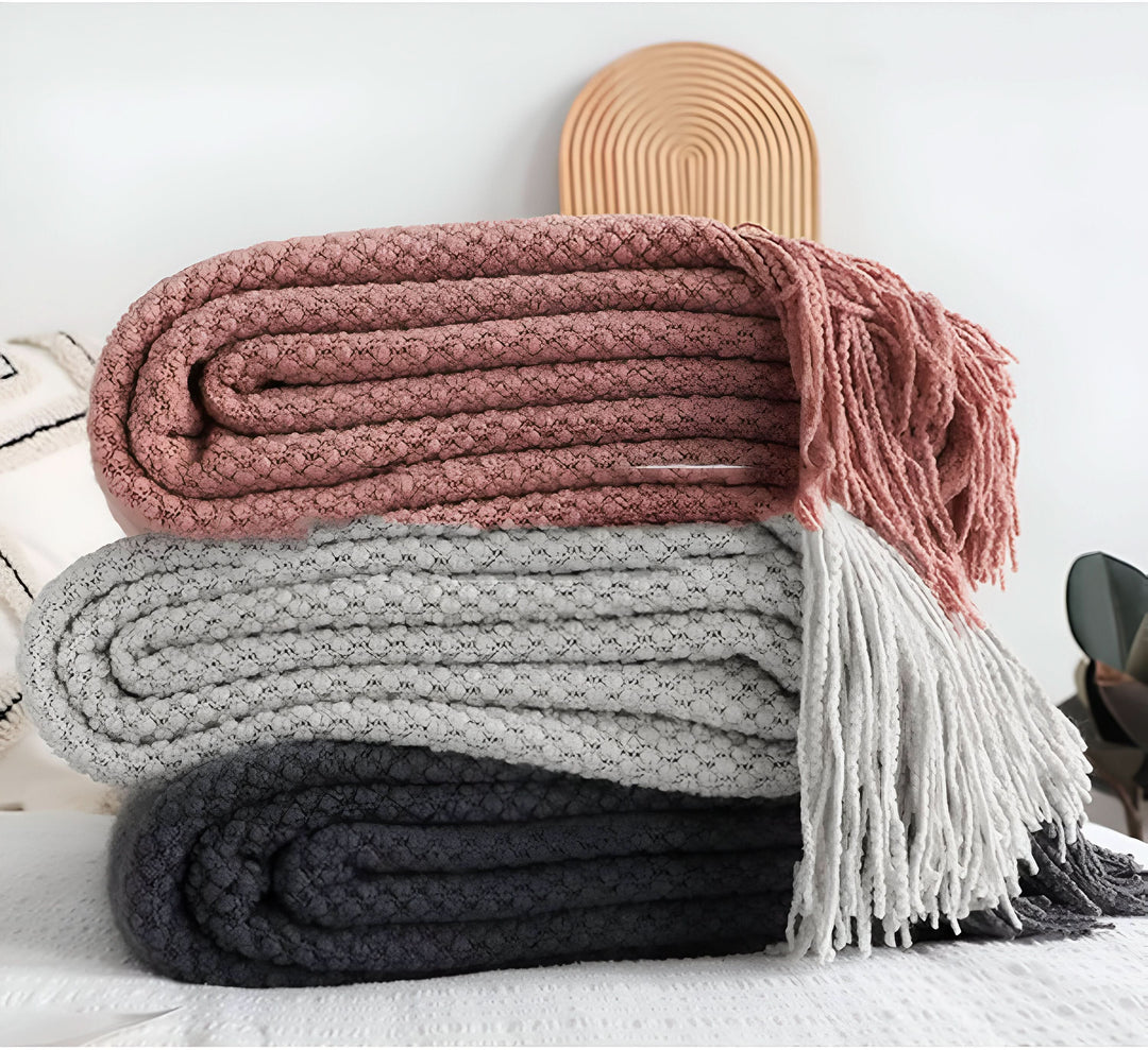 Skanto | KNITCOVE – Stilig strikket fleece teppe