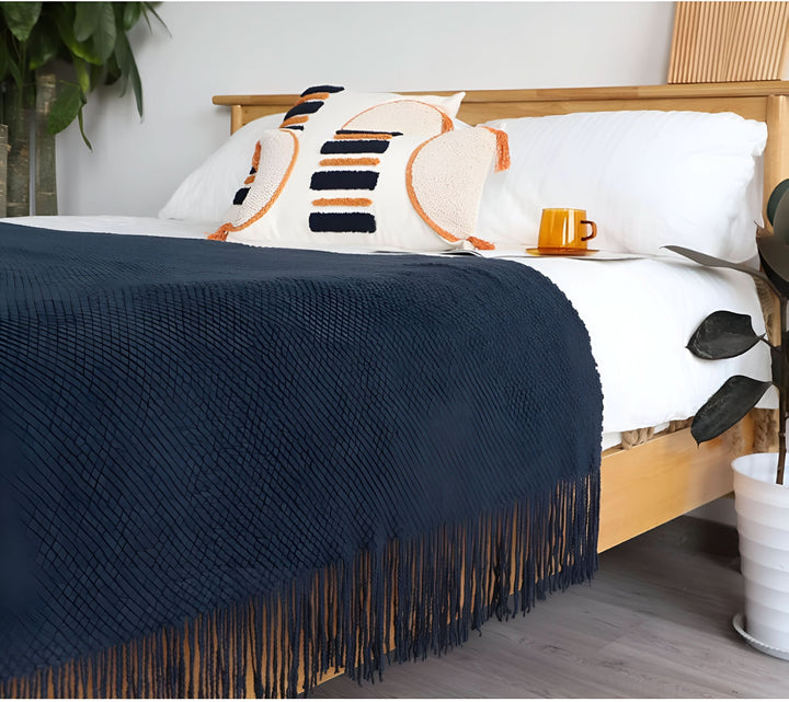 Skanto | KNITCOVE – Stilig strikket fleece teppe