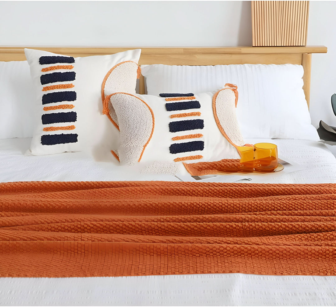 Skanto | KNITCOVE – Stilig strikket fleece teppe