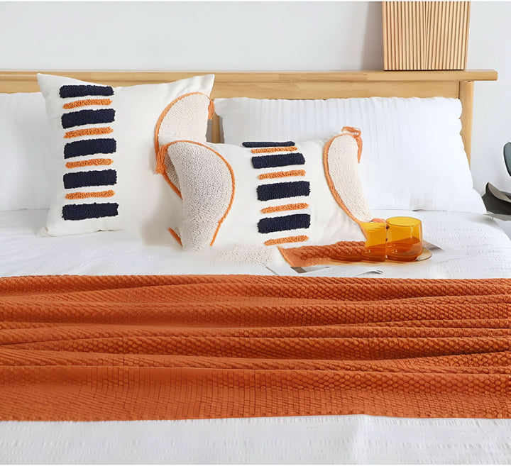 Skanto | KNITCOVE – Stilig strikket fleece teppe