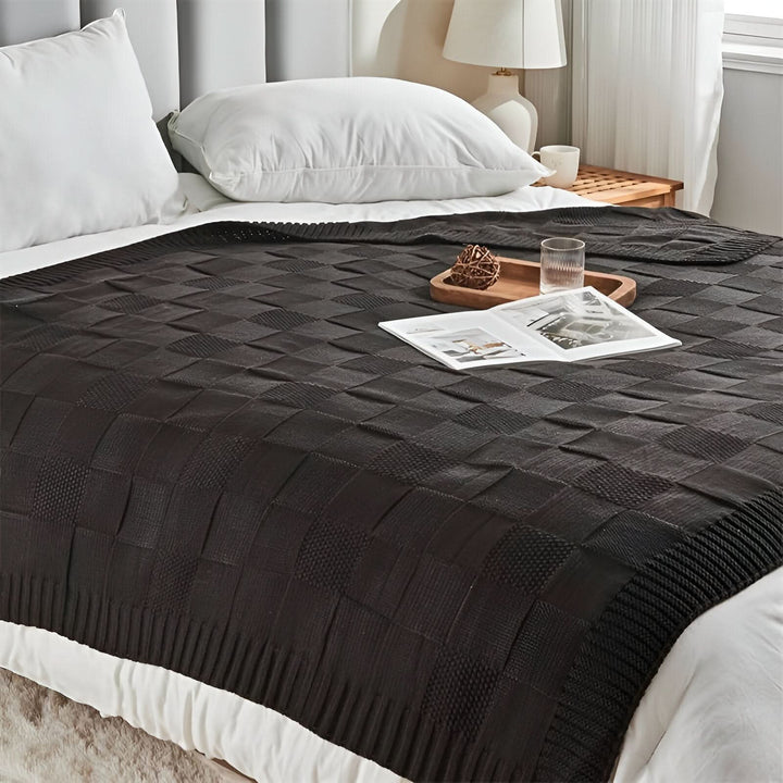Skanto | MONOSTRIPE – Minimalistisk strikket teppe