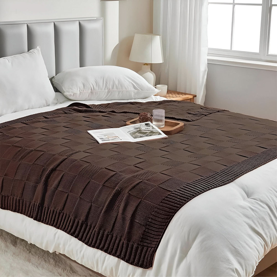 Skanto | MONOSTRIPE – Minimalistisk strikket teppe