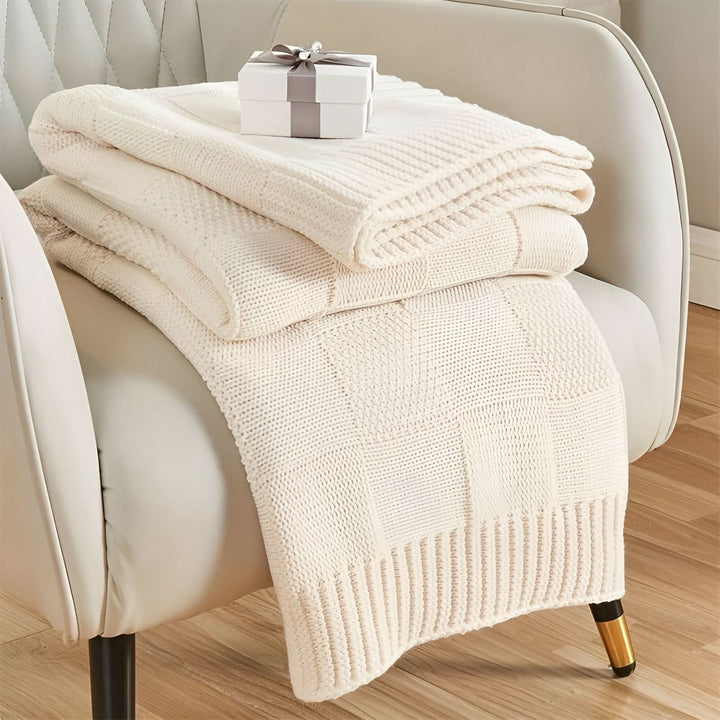 Skanto | MONOSTRIPE – Minimalistisk strikket teppe