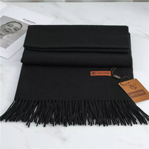 Skanto | Cashmere skjerf med dusker for varme og eleganse