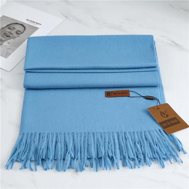 Skanto | Cashmere skjerf med dusker for varme og eleganse