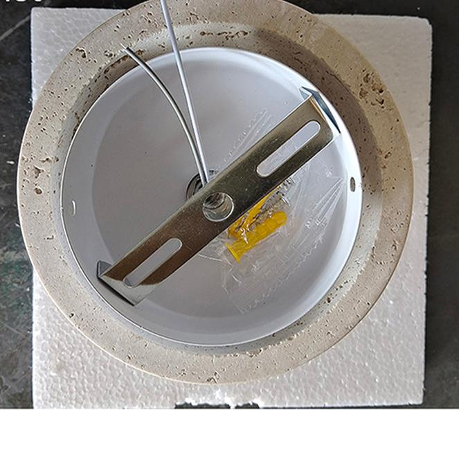 Norvo | Kremfarget vegglampe i skandinavisk stil som gir koselig lys og elegant enkelhet