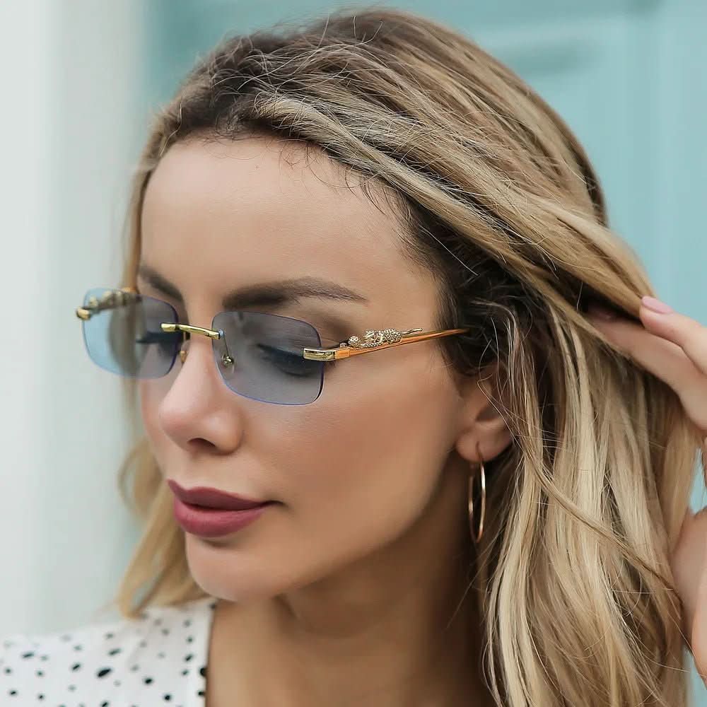 Randlose Sonnenbrille mit Leopardenkopf-Design og UV400-Schutz