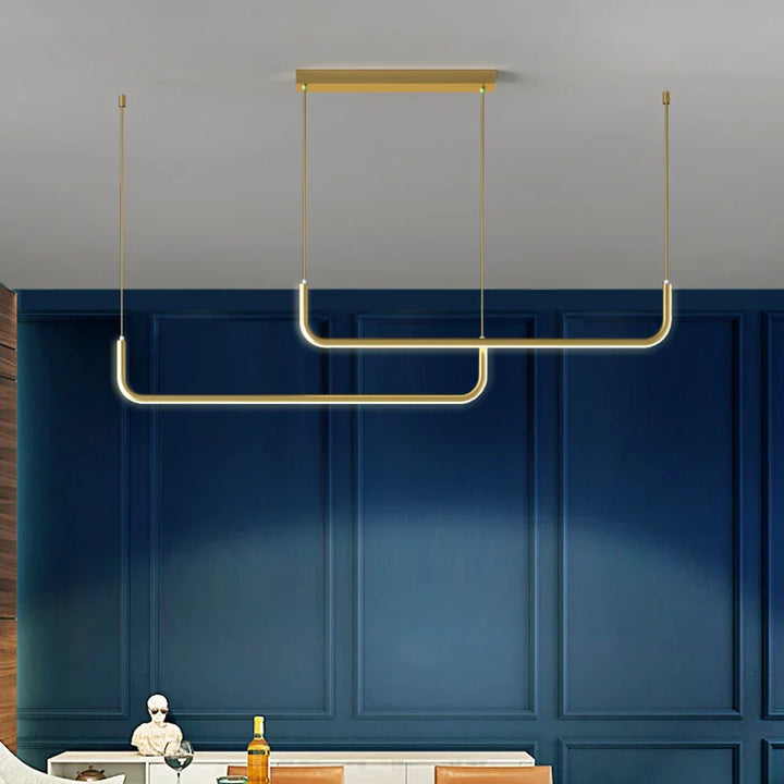 Moderne gullkrone for spisestue og stue – minimalistisk design med justerbare LED-pendler | Skanto
