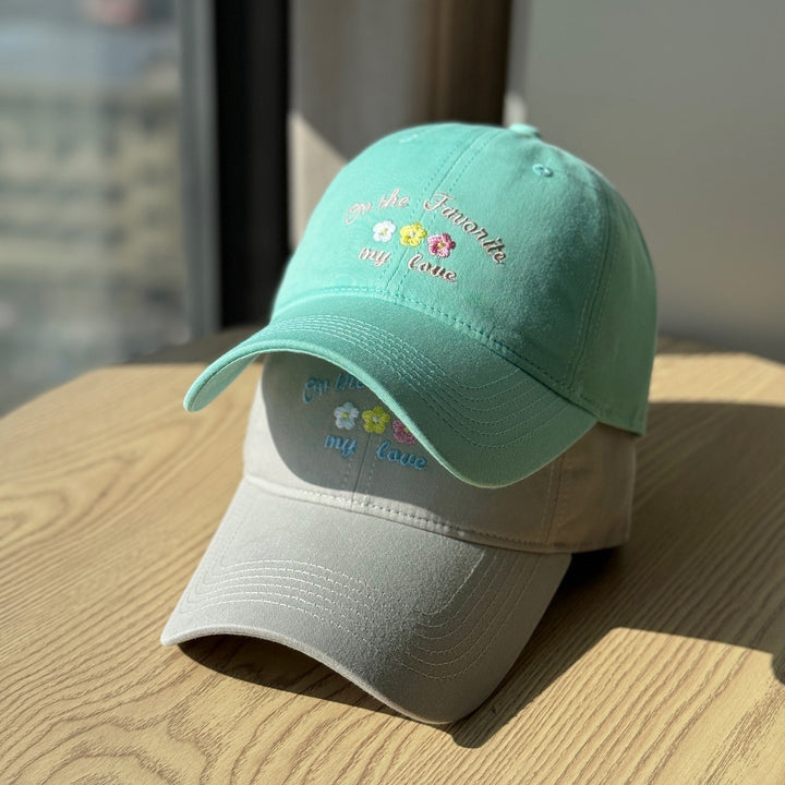 Kvinners broderte tekstlue Skanto