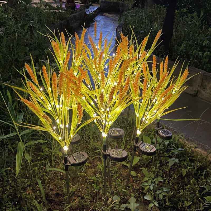 Solar LED Ornamentale Gress Stakelykter Med Integrert Solcellepanel Skanto