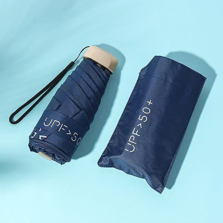 Damer UV-beskyttende sammenleggbar paraply med unikt design Skanto