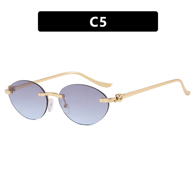 Women's elegant oval sunglasses with gold accent Skanto