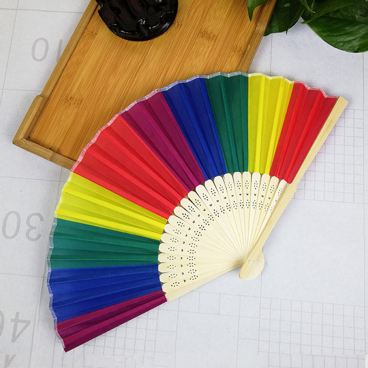 Dame fargerik håndvifte med kunstnerisk design Skanto