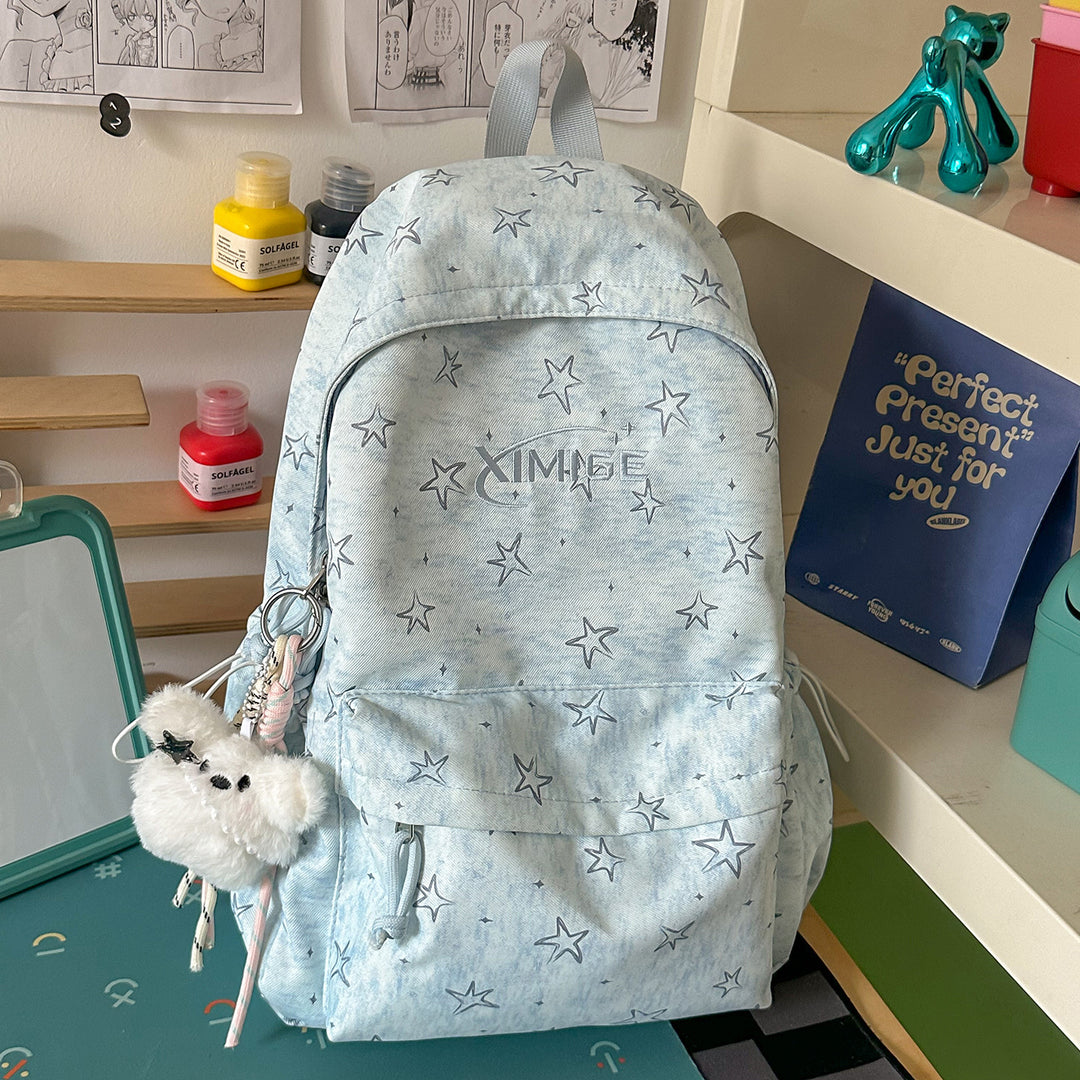 Stilig stjernesmykket skole ryggsekk