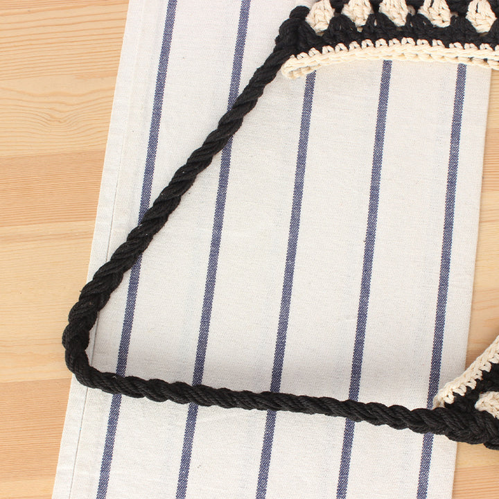 Handbag with artistic macrame design and durable inner bag Skanto