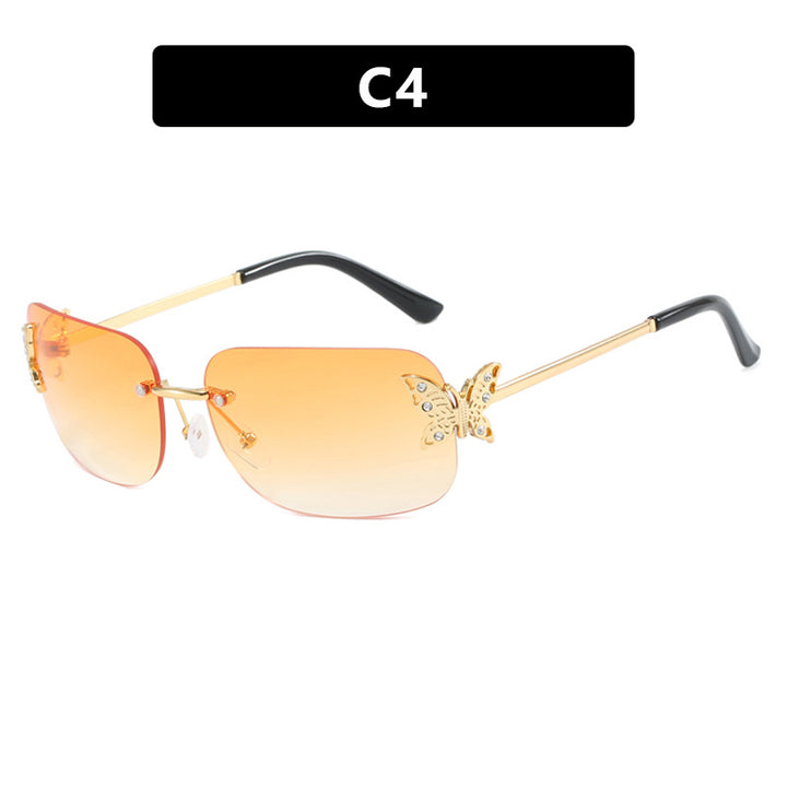 Women's fashionable sunglasses with filigree butterfly design and protective lenses Skanto
