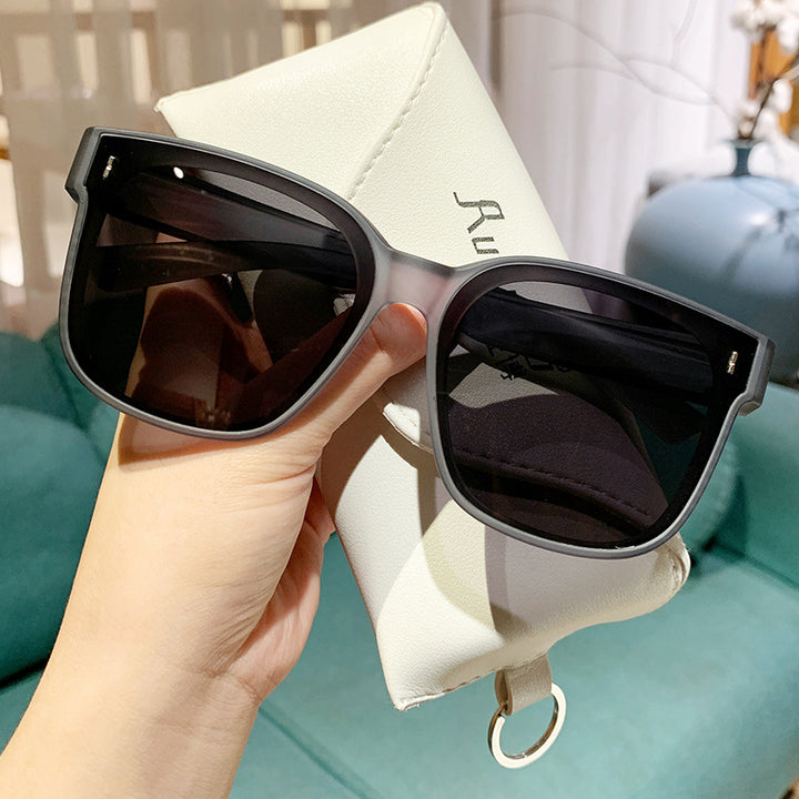 Dame Fashionable solbriller i trendy kvadratisk design Skanto