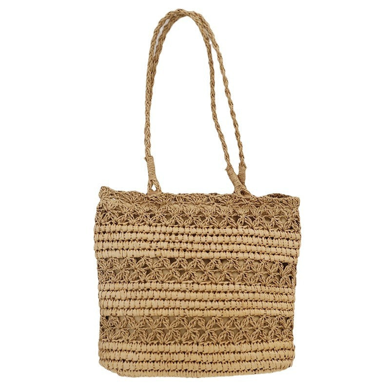 Hand-knotted beach bag in modern net design Skanto