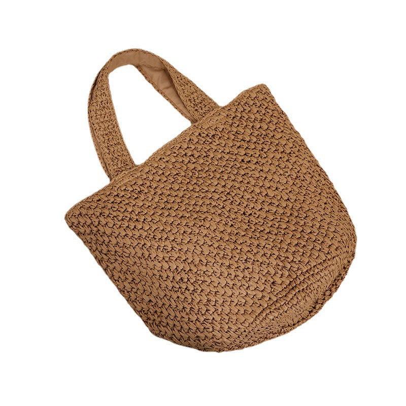 Stylish basket bag made of natural fiber with ample storage Skanto