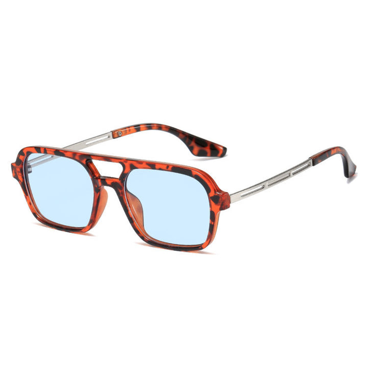 Dame designer solbrille med blå linser Skanto