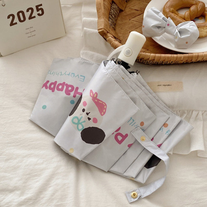 Dame Faltregnparaply med kreativt tegneserie-design Skanto