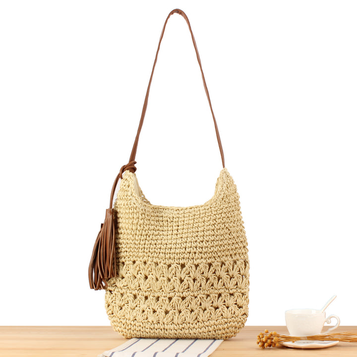 Shoulder bag made of hand-knotted natural materials with fringe-decorated shoulder strap Skanto