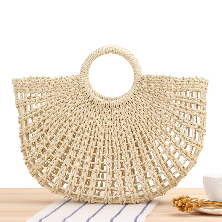 Handbag made of handmade weave with elegant round handle Skanto