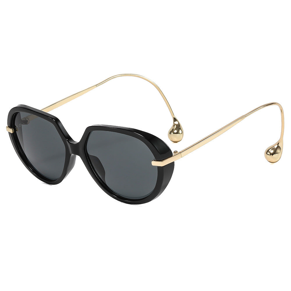 Women's Cat-Eye Sunglasses with Golden Details and Stylish Frame Skanto