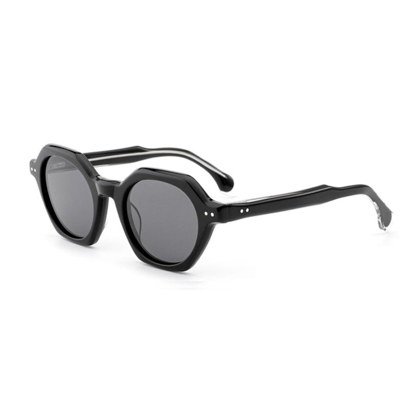 Dame solbrille i stilfull, sekskantet design med robust ramme og UV-beskyttelse Skanto