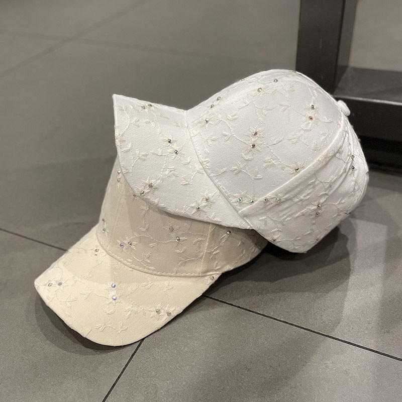 Kvinnebrodert baseball cap med rhinestones-detalj Skanto